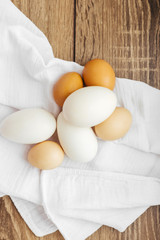 Chicken eggs on a white napkin