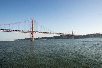 Fototapeta na wymiar Tajo river and Lisbon Bridge, Portugal