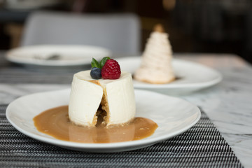 Salted Caramel Cheesecake Decorated with Berries