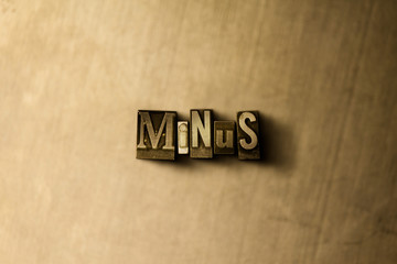 MINUS - close-up of grungy vintage typeset word on metal backdrop. Royalty free stock illustration.  Can be used for online banner ads and direct mail.