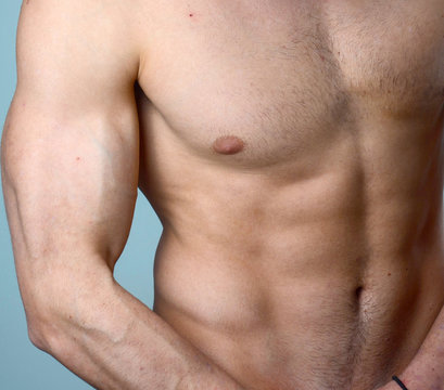 urecognizable young macho bodybuilder with sexy muscular body