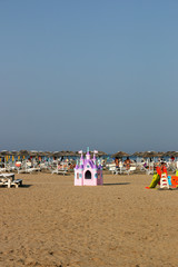 Pink castle on beach Rimini Italy