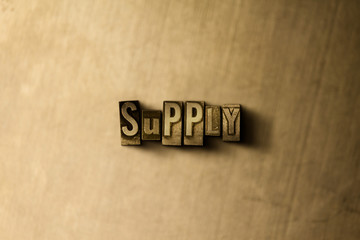 SUPPLY - close-up of grungy vintage typeset word on metal backdrop. Royalty free stock illustration.  Can be used for online banner ads and direct mail.