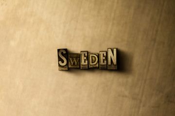 SWEDEN - close-up of grungy vintage typeset word on metal backdrop. Royalty free stock illustration.  Can be used for online banner ads and direct mail.