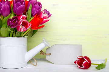 Tulip bouquet on  wooden background, copy space