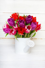 Tulip bouquet on  wooden background, copy space