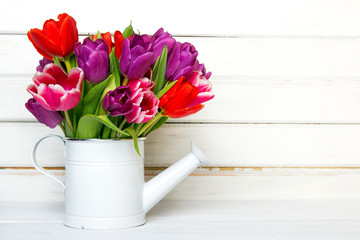 Tulip bouquet on  wooden background, copy space