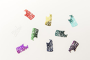 happy easter in german letters 'Frohe Ostern' in different colors, isolated on white background
