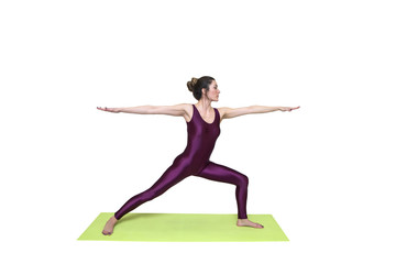 Young slim woman  practicing yoga in the studio