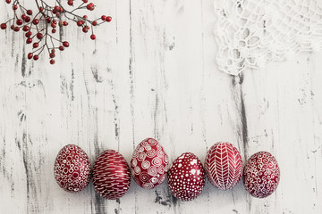 Decorated Easter eggs Pysanka on whitewashed wooden background © ansyvan