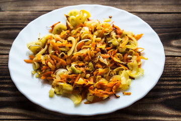 fried onion and carrot on plate