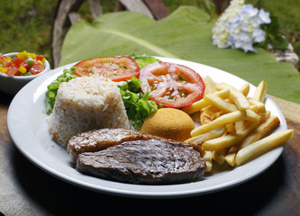 Rice with potatoes and meat.