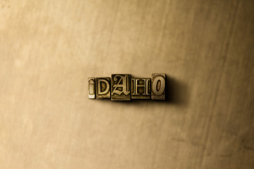 IDAHO - close-up of grungy vintage typeset word on metal backdrop. Royalty free stock illustration.  Can be used for online banner ads and direct mail.
