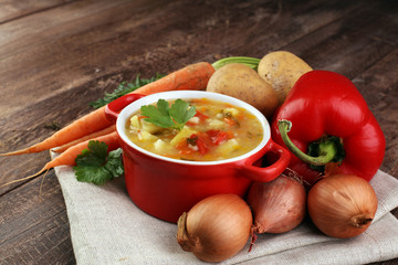 Barley and vegetable thick healthy soup. Krupnik thick Polish soup made from vegetable or broth, containing potatoes and barley groats