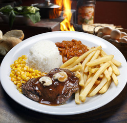 rice, beans, meat, chips and salad