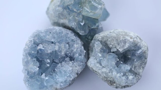 Celestite (Celestine ) three crystals on the white background. flicker