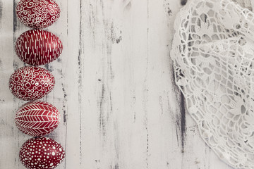 Decorated Easter eggs Pysanka on whitewashed wooden background © ansyvan
