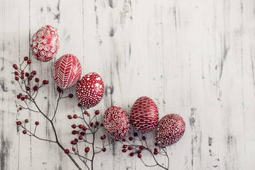 Decorated Easter eggs Pysanka on whitewashed wooden background © ansyvan