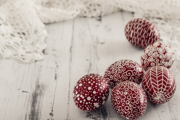 Decorated Easter eggs Pysanka on whitewashed wooden background © ansyvan