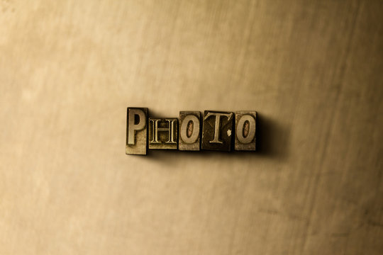 PHOTO - close-up of grungy vintage typeset word on metal backdrop. Royalty free stock illustration.  Can be used for online banner ads and direct mail.
