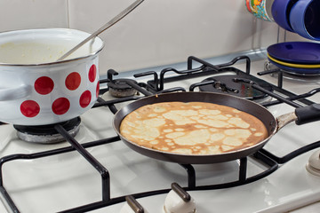 Cooking pancakes on Shrove Tuesday