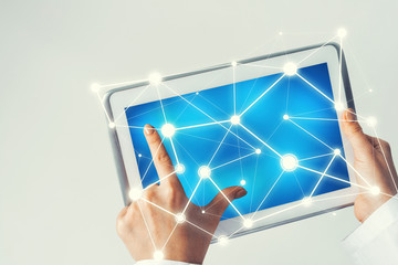 Close of female doctor hands working with tablet pc computer