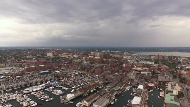 Portland Maine Aerial v5 Flying low over harbor panning with city views.