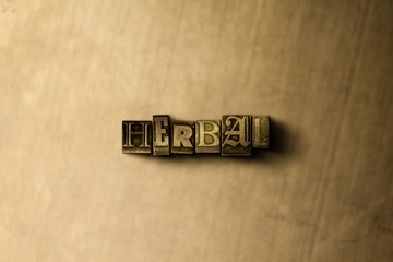 HERBAL - close-up of grungy vintage typeset word on metal backdrop. Royalty free stock illustration.  Can be used for online banner ads and direct mail.