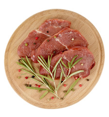 Veal on the board with spices