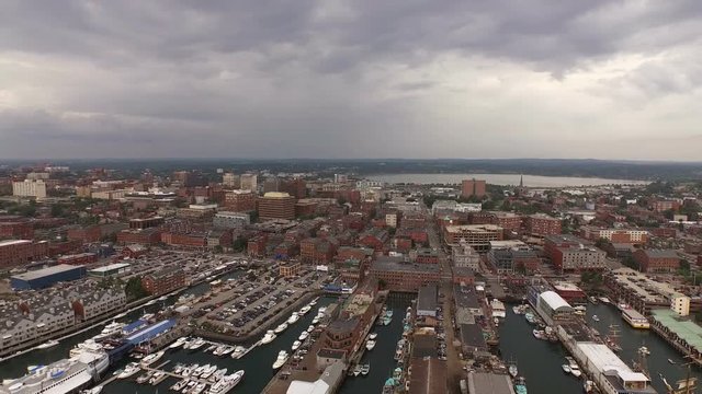 Portland Maine Aerial v6 Flying low over city and harbor panning.