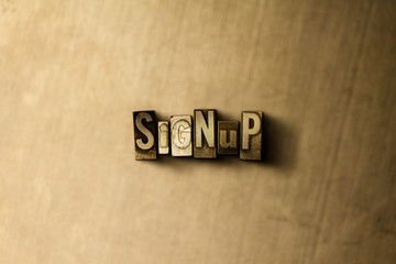 SIGNUP - close-up of grungy vintage typeset word on metal backdrop. Royalty free stock illustration.  Can be used for online banner ads and direct mail.