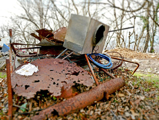 Garbage abandoned in a suburban park. 