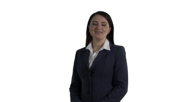 Cheerful woman in dark suit talking to camera on white background. 4k footage PNG with alpha channel.