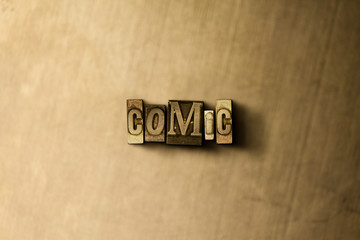 COMIC - close-up of grungy vintage typeset word on metal backdrop. Royalty free stock illustration.  Can be used for online banner ads and direct mail.