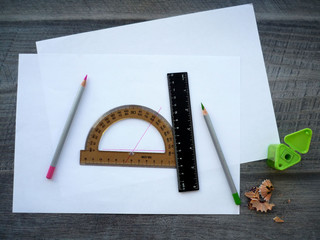 Ruler,pencil and protractor on paper sheet