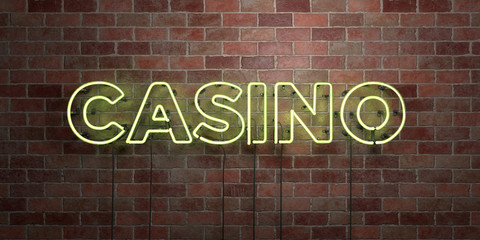 CASINO - fluorescent Neon tube Sign on brickwork - Front view - 3D rendered royalty free stock picture. Can be used for online banner ads and direct mailers..