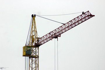 Crane and building construction site