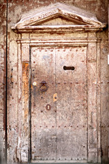 An old wooden door in Palermo. Italy.