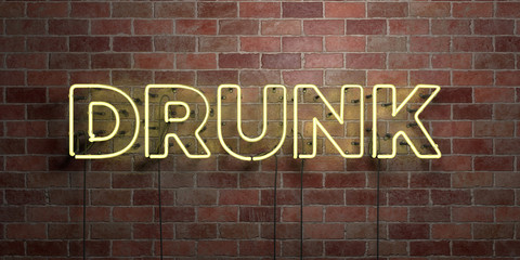 DRUNK - fluorescent Neon tube Sign on brickwork - Front view - 3D rendered royalty free stock picture. Can be used for online banner ads and direct mailers..