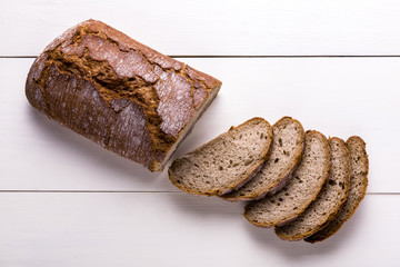 freshly baked loaf of bread on a wooden table