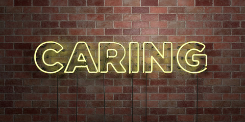CARING - fluorescent Neon tube Sign on brickwork - Front view - 3D rendered royalty free stock picture. Can be used for online banner ads and direct mailers..