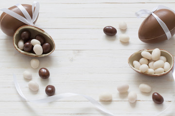 Chocolate Easter Eggs Over Wooden Background