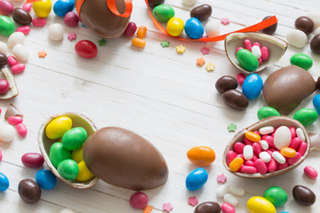 Chocolate Easter Eggs Over Wooden Background