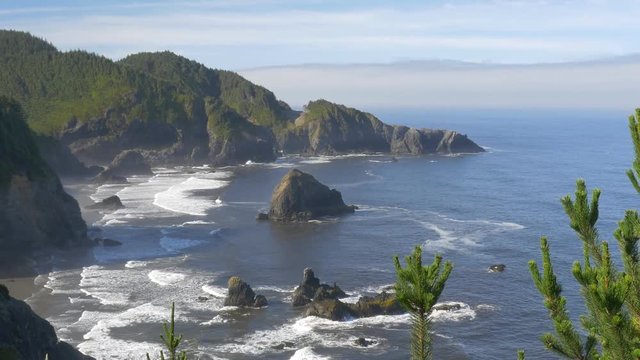 Zooming out, early morning view of the rocky coast in the Samuel H. Boardman State Scenic Corridor, southern Oregon coast.