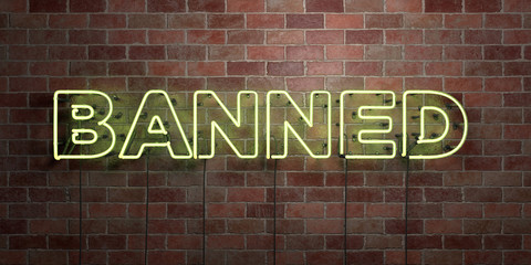 Obraz premium BANNED - fluorescent Neon tube Sign on brickwork - Front view - 3D rendered royalty free stock picture. Can be used for online banner ads and direct mailers..