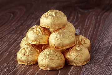 Candy in gold wrapper