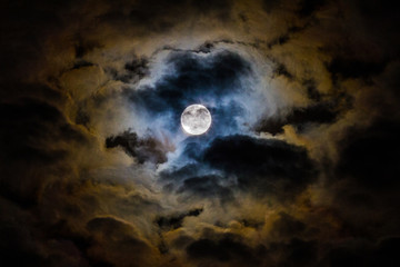 Obraz na płótnie Canvas Night and dark clouds with the moon