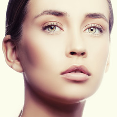 Girl face. Health and care style. Perfect skin woman with green eyes