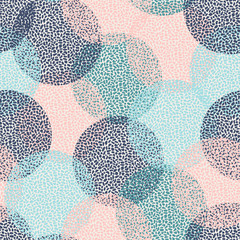 Abstract seamless pattern in green, blue and pastel pink.