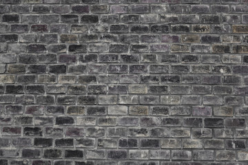 dark gray brick wall